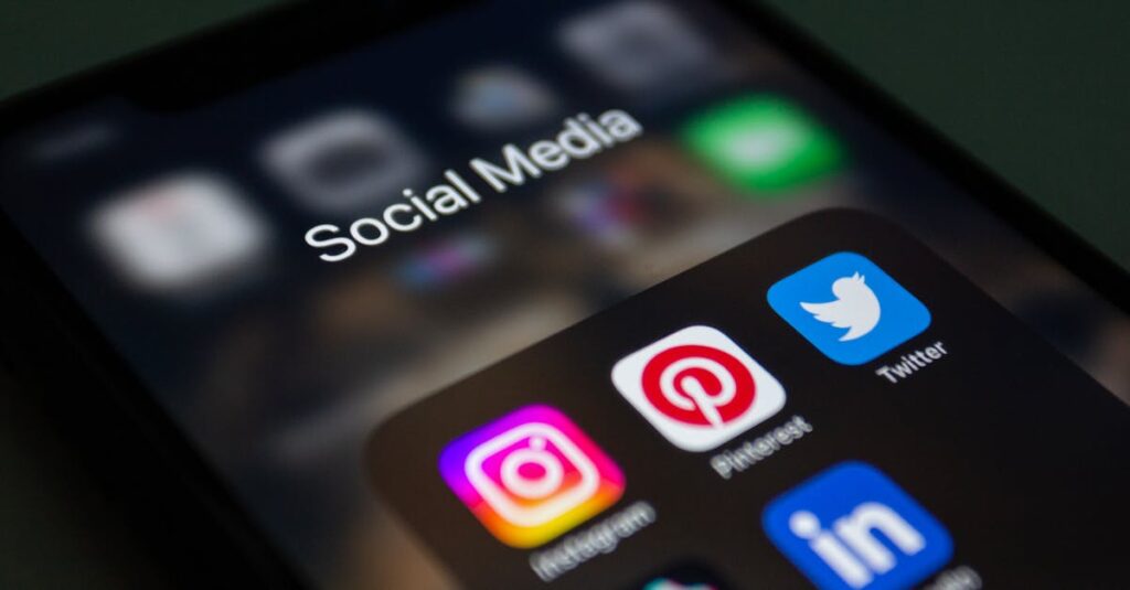 A smartphone screen displaying popular social media applications like Instagram and Twitter.